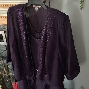 Very nice satin dress. Worn once. Short sleeve with waist length matching jacket